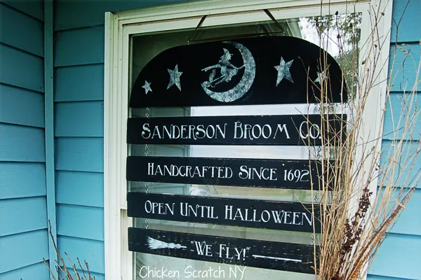 Craft your own Halloween window sign for the Sanderson Broom Co to welcome guests and ghouls