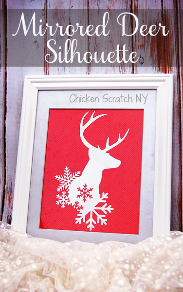 Use an vinyl stencil and looking glass spray paint to craft a winter deer mirror perfect to reflect the twinkling holiday lights