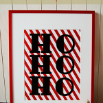 metallic red frame with striped foil paper and sude paper letters HO HO HO