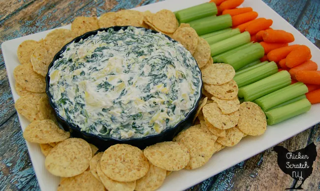 A quick and healthy variation of spinach artichoke dip that comes together almost instantly to get you back to the game in no time #MadewithChobani #sponsored
