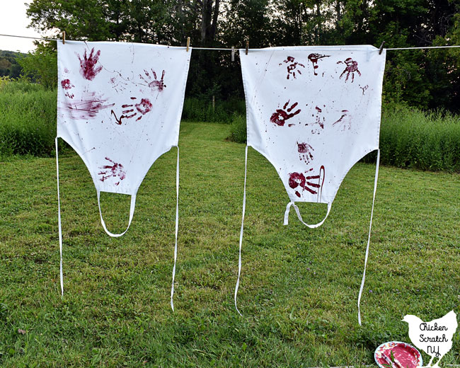 bloody Halloween aprons hanging on a clothesline