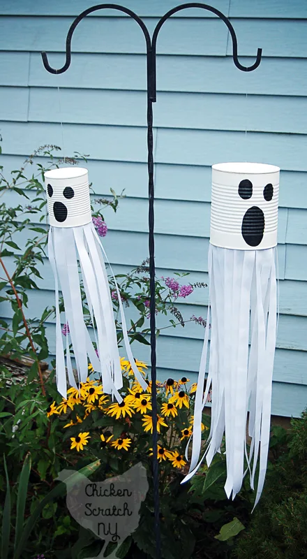 Get ready for Halloween with this DIY tutorial for a ghost windsock with ribbon and paint for a spooky friend straight from the recycle bin