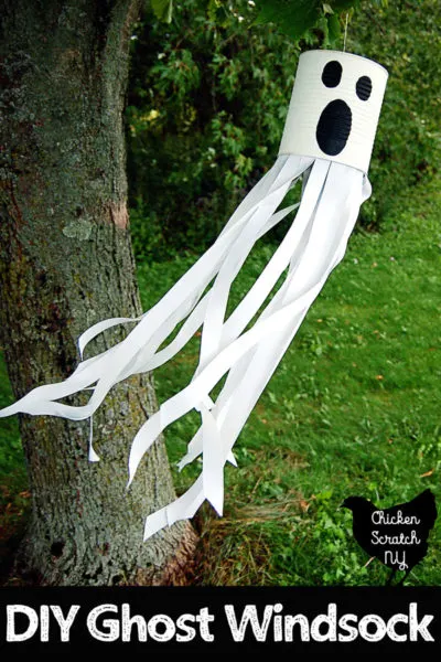 #10 can painted white with a black ghost face a nd white ribbon glued to the inside to make a Halloween ghost windsock