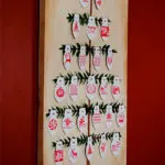Craft a Christmas Countdown Tree you can use year after year. Customize by changing the paper ornaments to fit your color scheme