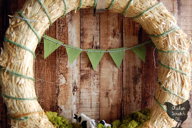 Add some rural charm to your front door with a DIY Spring Farm Wreath featuring a straw wreath, bailing twine and cows with this quick & easy tutorial