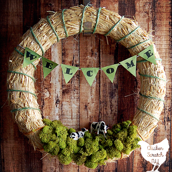 Add some rural charm to your front door with a DIY Spring Farm Wreath featuring a straw wreath, bailing twine and cows with this quick & easy tutorial