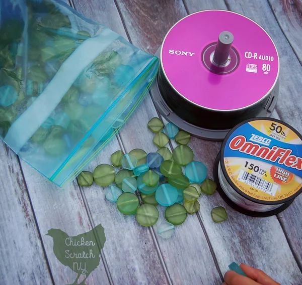 Use up old CDs with this fun rainy day craft project. Easy enough for a three year old and pretty enough to decorate any garden