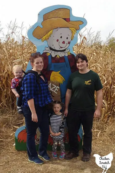 happy family at a corn maze