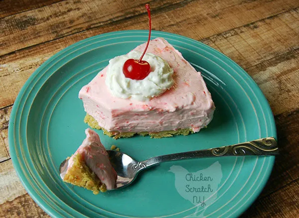 Whip up a sweet dessert with this Shirley Temple No Bake Cheesecake recipe. Made with cream cheese, maraschino cherries and real whipped cream in a lemon Oreo crust it's sure to be a hit