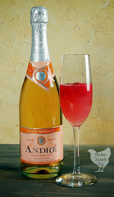 Celebrate with a Raspberry Peach Mimosa full of fresh flavors and bubbles! If a classic mimosa and a peach Bellini made a baby this would be it