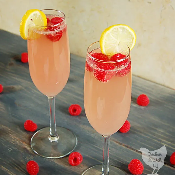 Celebrate with a Raspberry Peach Mimosa full of fresh flavors and bubbles! If a classic mimosa and a peach Bellini made a baby this would be it