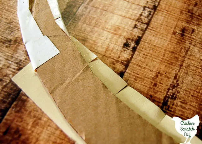 covering cardboard wreath form with white duct tape