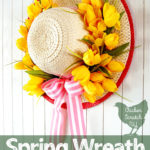 sun hat turned into a apring wreath with yellow tulips and pink striped ribbon