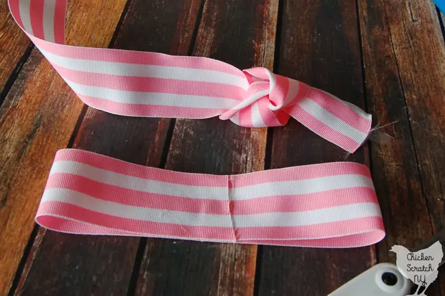 striped ribbon tied onto a bow