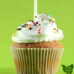 cupcake with candle and text overlay for every cake vodka recipe you'll ever need