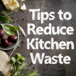 wooden board with olives, chees and herbs with text overlay Tips to Reduce kitchen waste