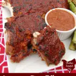 rhubarb BBQ sauce covered ribs on a white late on a red and white table cloth with a white dish filled with more BBQ sauce