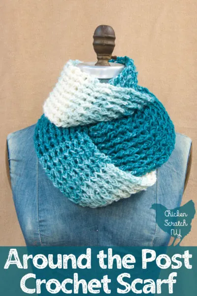 blue denim mannequin with a cream and teal scarf wrapped around its neck against a camel background with around the post crochet scarf text overlay 