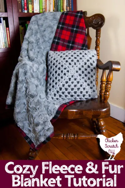 grey fur and red plaid flannel blanket sitting on a rocking chair with a crocheted pillow cover