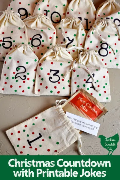 Christmas countdown made with muslin bags, hand numbers with green and red polka dots filled with jokes and hot cocoa packets
