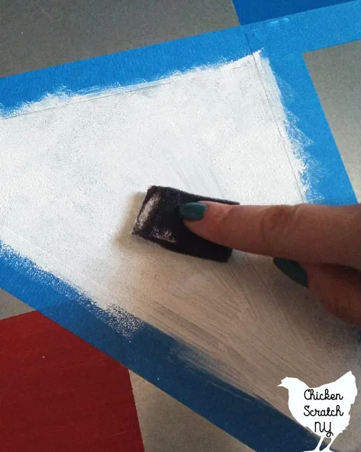 using a sponge brush to paint on metal with DecoArt Americana Multi-surface paint in cotton ball