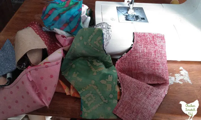 group of face masks sewn together out of quilter cotton with a home sewing machine