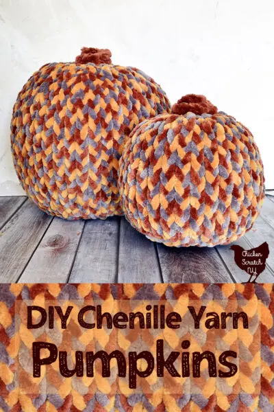 two fake pumpkins covered with chenille yarn braids held on by straight pins for DIY fall home decor