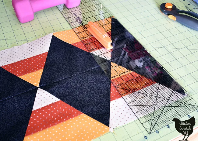 trim table runner to a rectangle with a long ruler