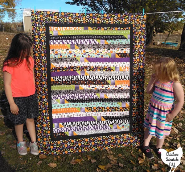 Halloween jelly roll race quilt using Hocus Pocus fabric