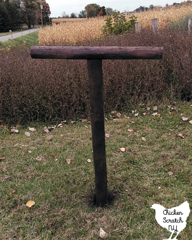 brown fence post scarecrow body