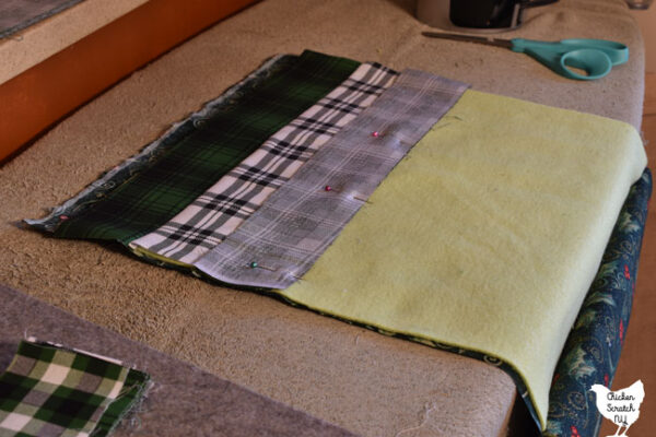 pin fabric strip face side down before sewing