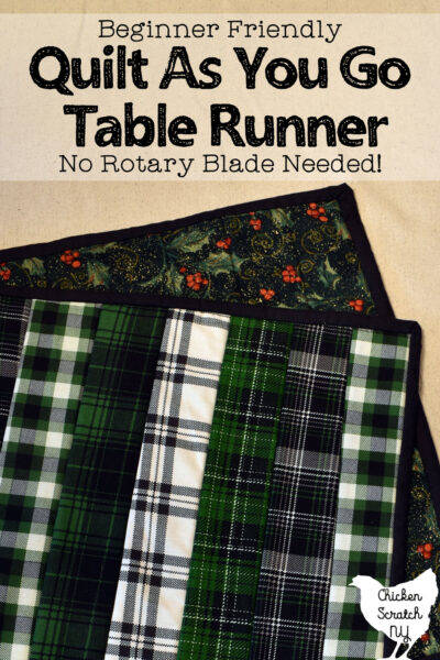 green plaid and Christmas fabric reversible table runner made with the quilt as you go method