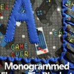 video game patterned fleece and solid blue fleece tie blanket monogrammed with a large fleece A with text overlay "monogrammed fleece tie blanket the easy way"