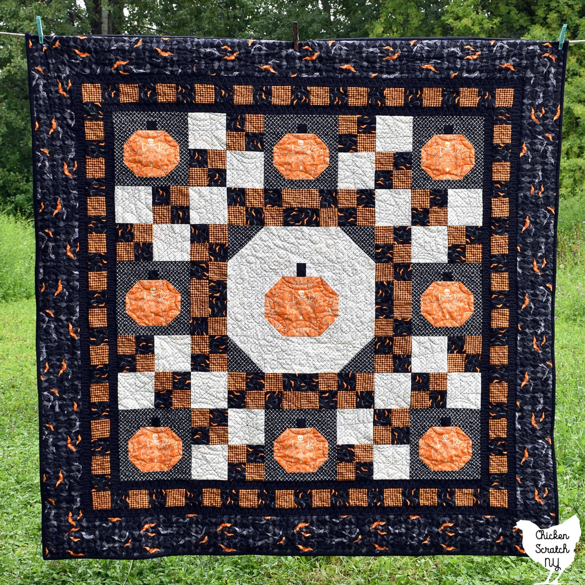 Halloween version of the pumpkin lattice quilt made with Midnight Haunt fabric from andover