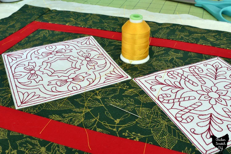 Christmas Table runner with long basting stitches made with yellow thread 