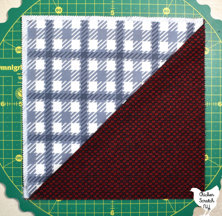 half square triangle made with two plaid fabrics