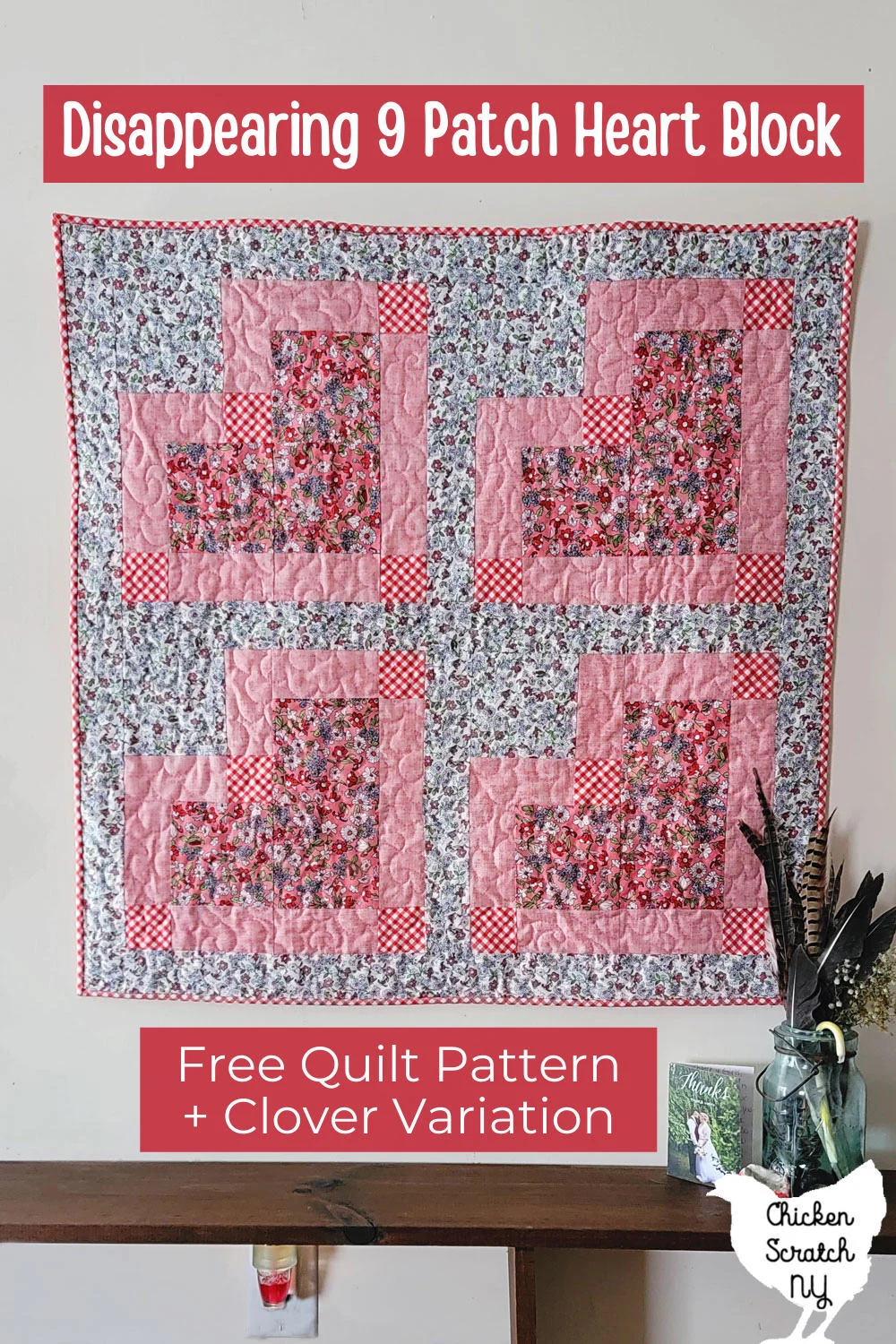 wall quilt made with 4 hearts sewn from pink and white floral prints