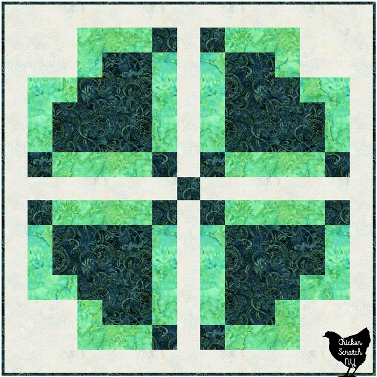 Disappearing nine patch clover wall quilt made with green batik