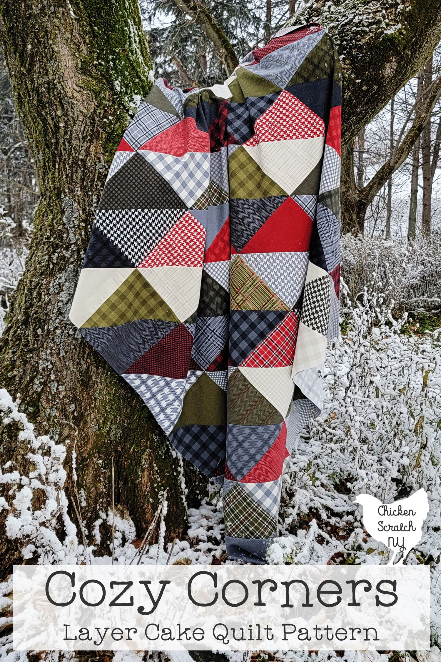cozy corners quilt sewn with red, green, cream and gray flannel displayed in a tree surrounded by snow with text overlay "cozy corners layer cake quilt pattern"