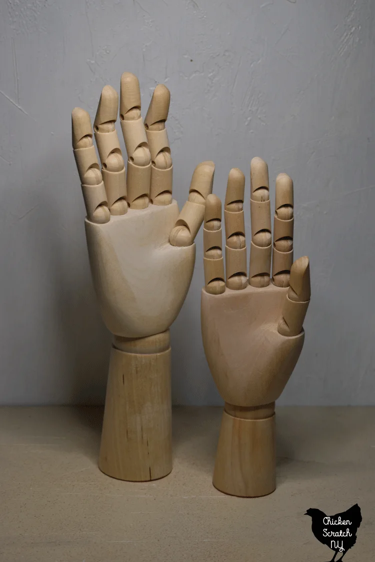 wooden drawing hands from Amazon and Michael's 