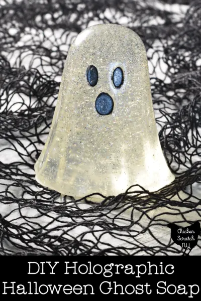 halloween ghost soap made with clear melt and pour soap and holographic glitter with black mica face