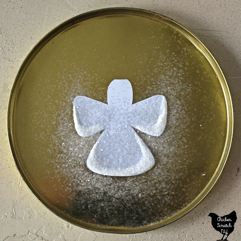 add glitter to snow angel ornament