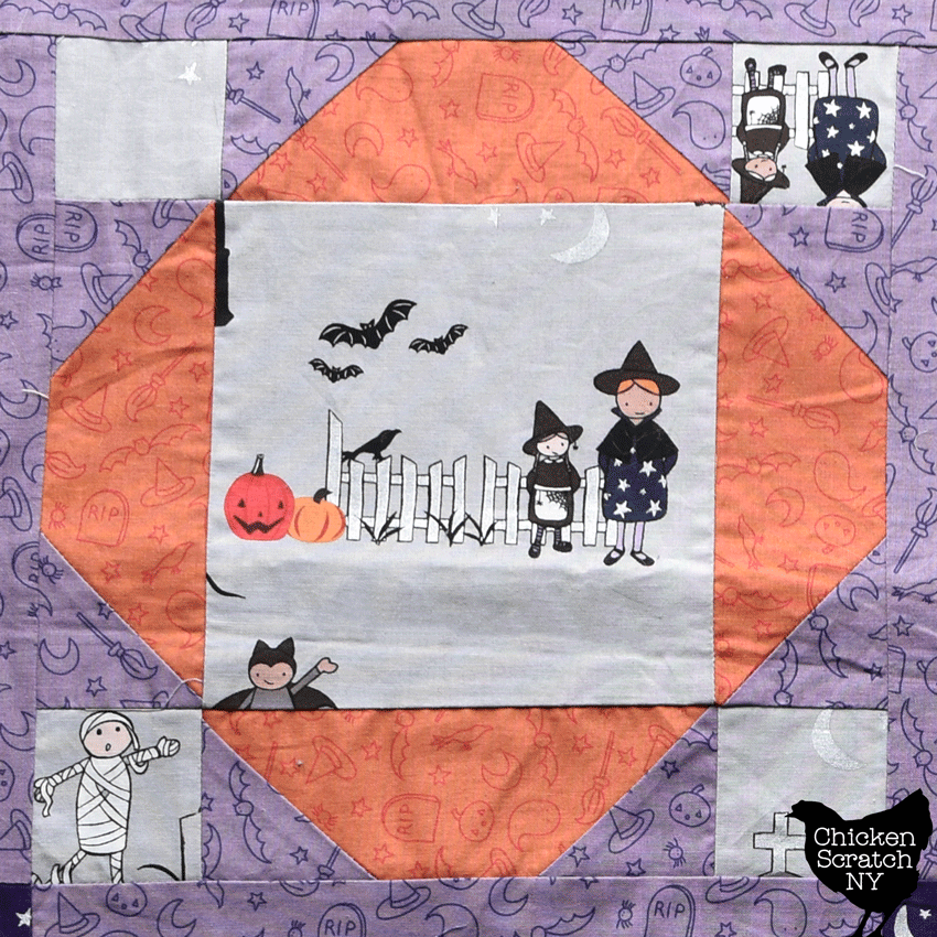 single block from Cake Show quilt made from Spooky Hallow Halloween fabric showing off fussy cut center block
