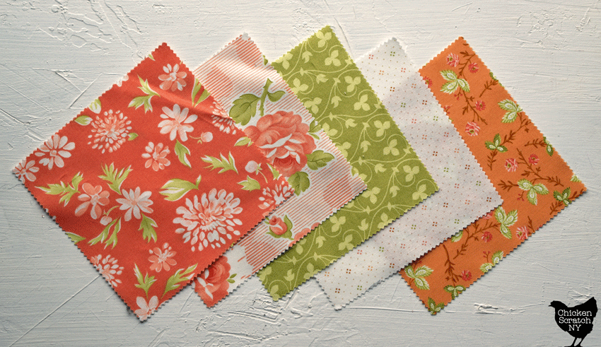 5 Charm Squares from Moda laid out showing the precut edges