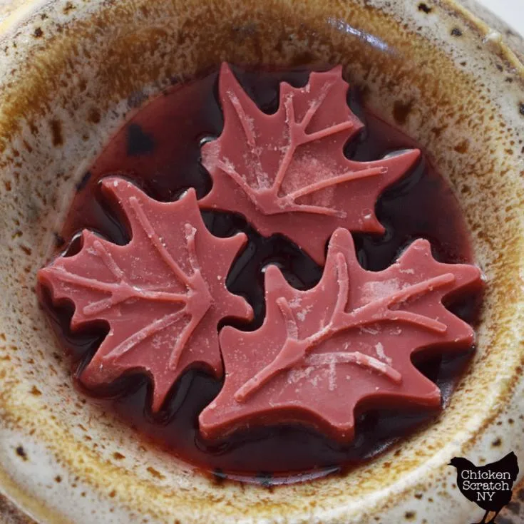 three leaf shaped wax melts in a wax melter